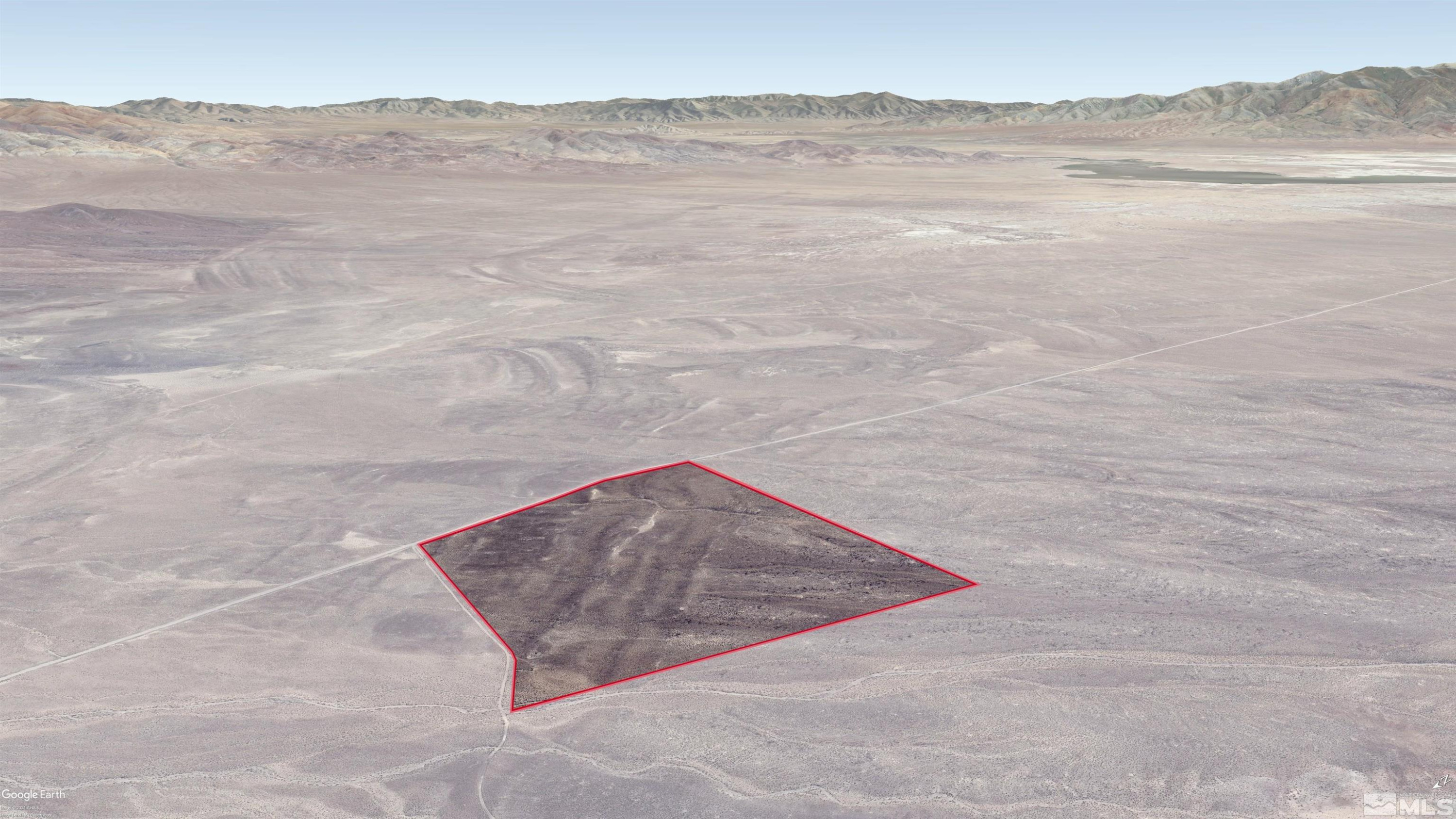 23001 Jungo Road Lovelock, NV 89419 - Photo 5 of 6 a view of wooden floor and a mountain view