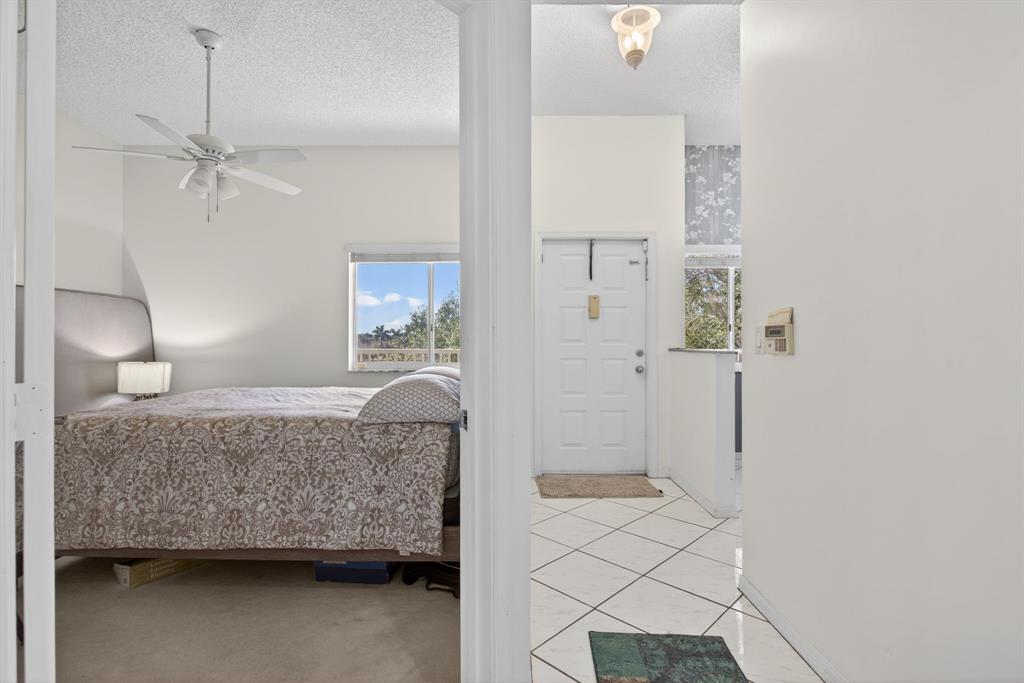 9575 Weldon Circle, Unit C413 Tamarac, FL 33321 - Photo 11 of 65 Guest bedroom