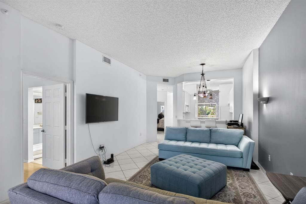 9575 Weldon Circle, Unit C413 Tamarac, FL 33321 - Photo 18 of 65 Main family room