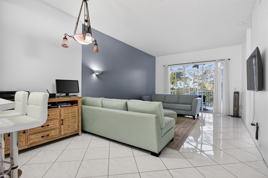 9575 Weldon Circle, Unit C413 Tamarac, FL 33321 - Photo 19 of 65 Main family room