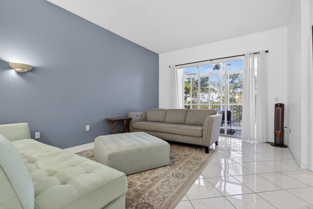 9575 Weldon Circle, Unit C413 Tamarac, FL 33321 - Photo 20 of 65 Main family room