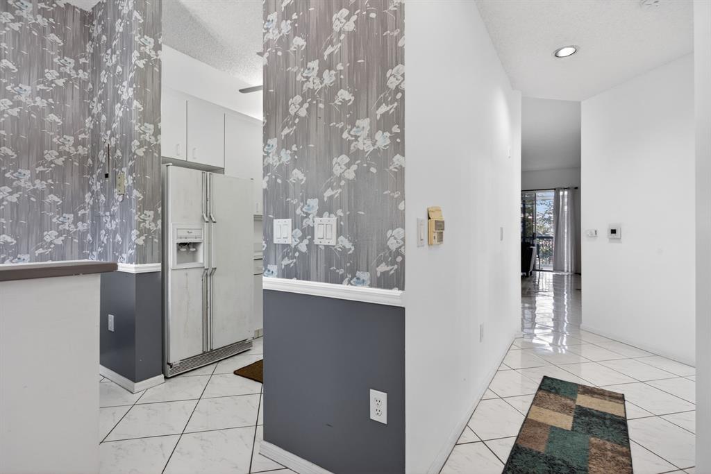 9575 Weldon Circle, Unit C413 Tamarac, FL 33321 - Photo 6 of 65 Entryway