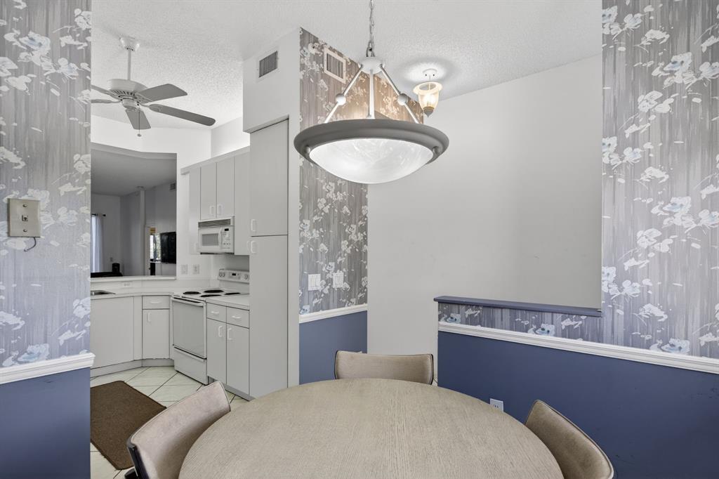 9575 Weldon Circle, Unit C413 Tamarac, FL 33321 - Photo 8 of 65 Eat-in kitchen