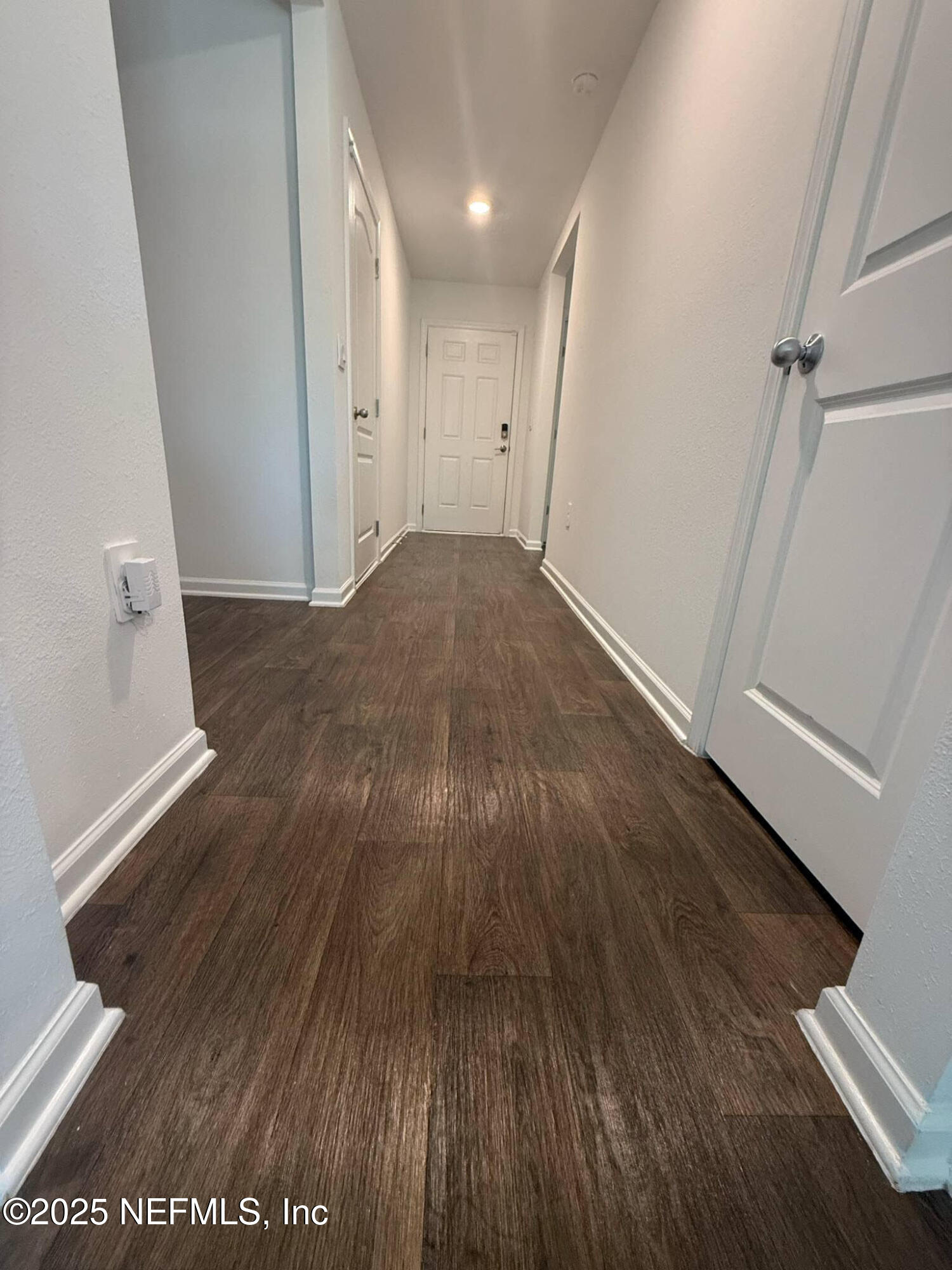 65183 Forest Glen Lane Yulee, FL 32097 - Photo 16 of 44 wooden floor in an empty room