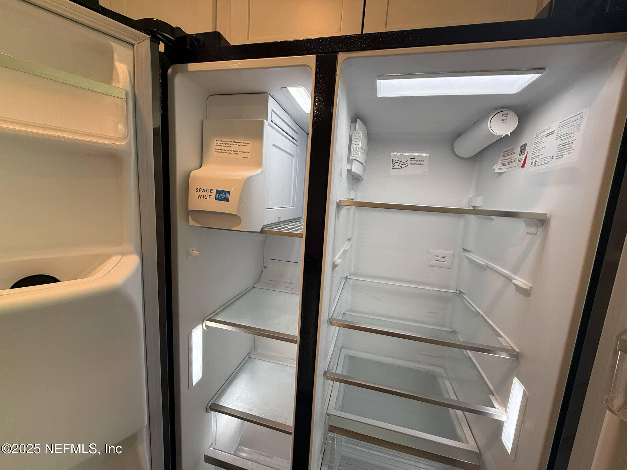 65183 Forest Glen Lane Yulee, FL 32097 - Photo 27 of 44 a view of staircase with a glass door and a shower