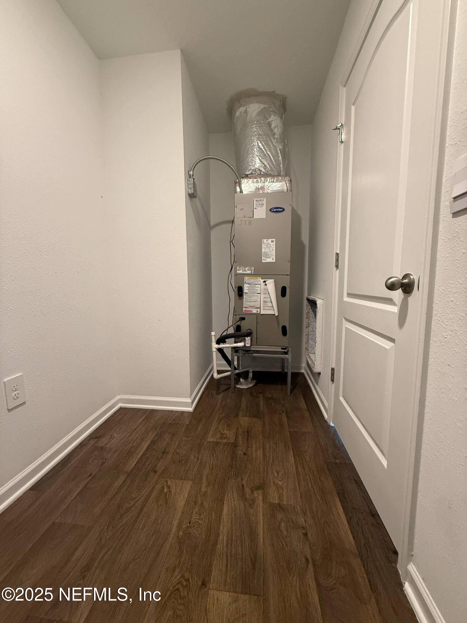 65183 Forest Glen Lane Yulee, FL 32097 - Photo 42 of 44 a view of a room with wooden floor and furniture