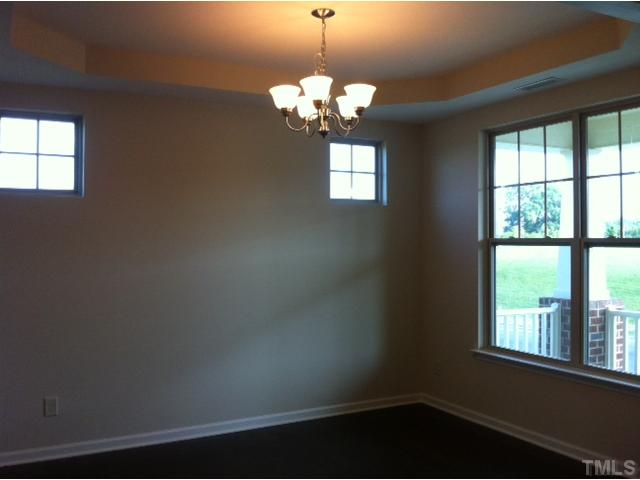4139 Davis Meadow Street Raleigh, NC 27616 - Photo 5 of 25 Dining Room offers natural light and hardwoods through out!