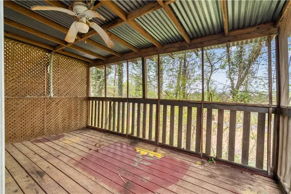 a view of wooden balcony with wooden floor