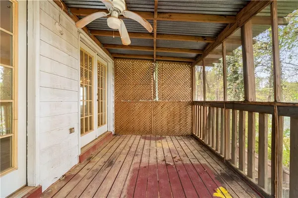 a view of outdoor space with wooden floor