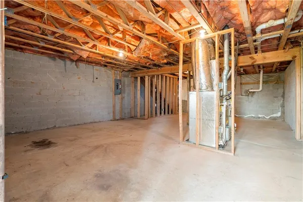 a view of a room with wooden walls