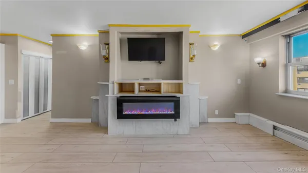 a bedroom with closet and window