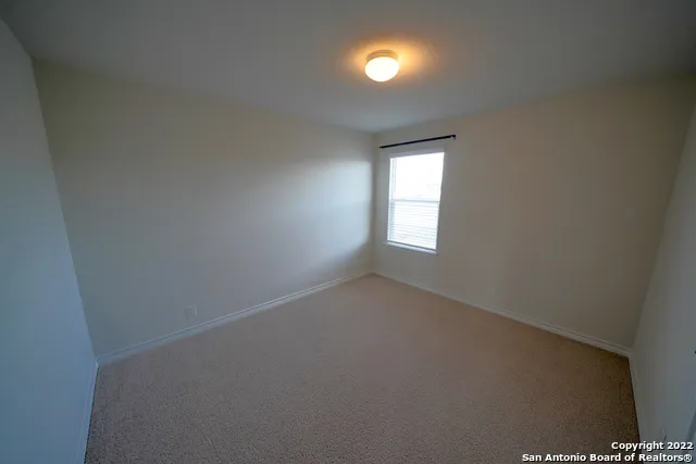 a view of empty room with window