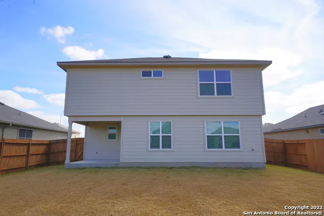 a front view of a house with a garage