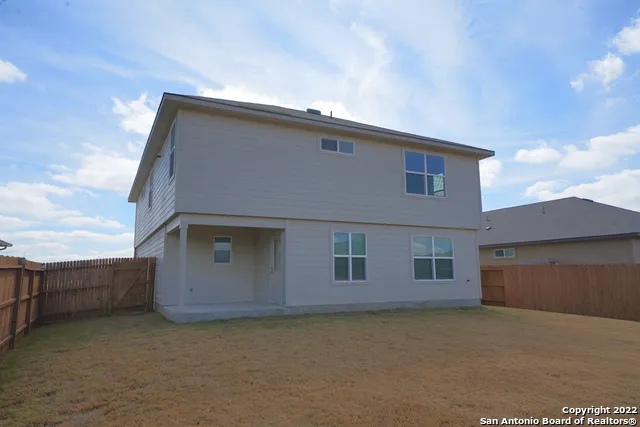 front view of a house with a street