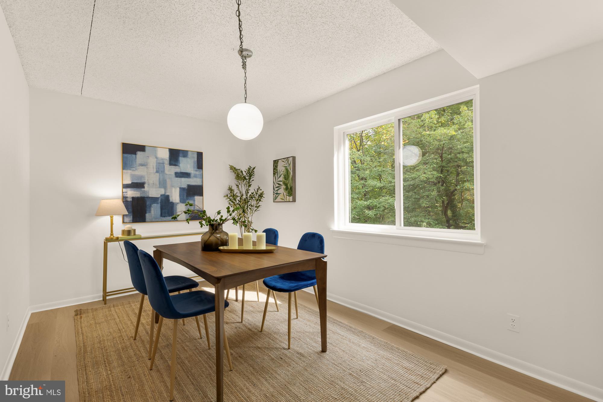 11833 Shire Court, Unit 21B Reston, VA 20191 - Photo 12 of 37 a dining room with furniture and window