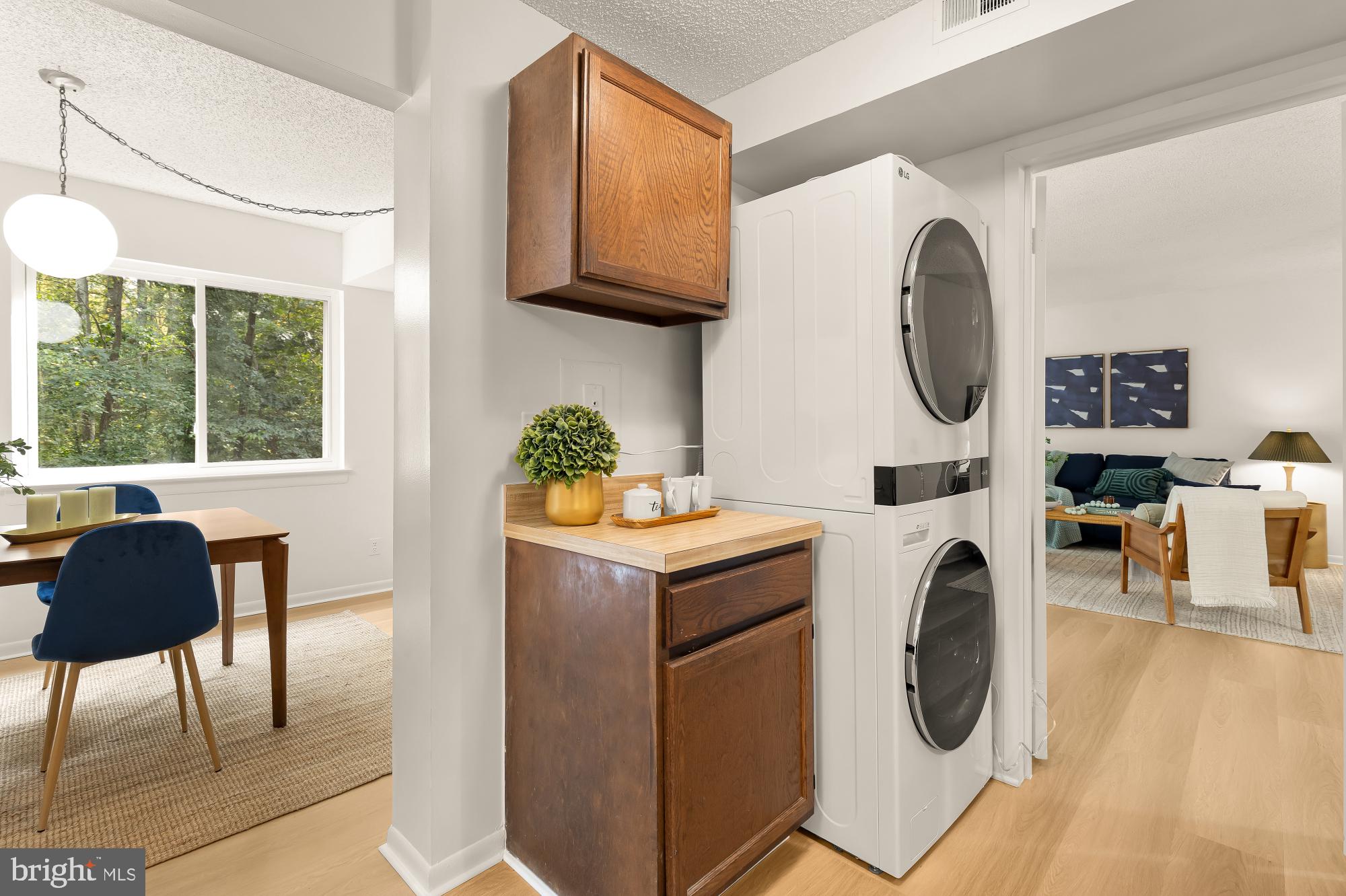 11833 Shire Court, Unit 21B Reston, VA 20191 - Photo 15 of 37 a utility room with dryer and washer