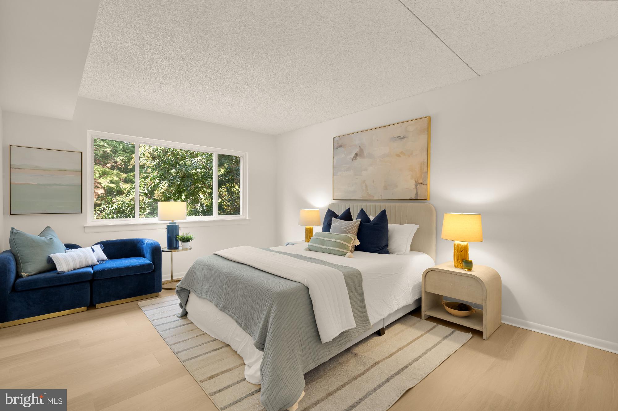 11833 Shire Court, Unit 21B Reston, VA 20191 - Photo 19 of 37 a bedroom with a bed and a window