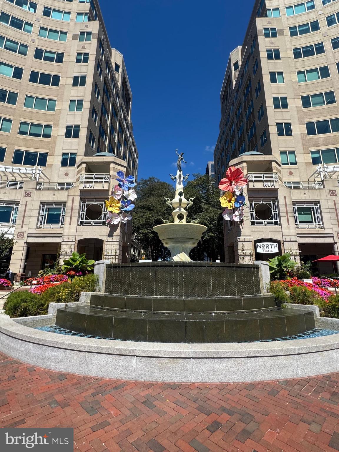 11833 Shire Court, Unit 21B Reston, VA 20191 - Photo 35 of 37 a view of a building with cars parked