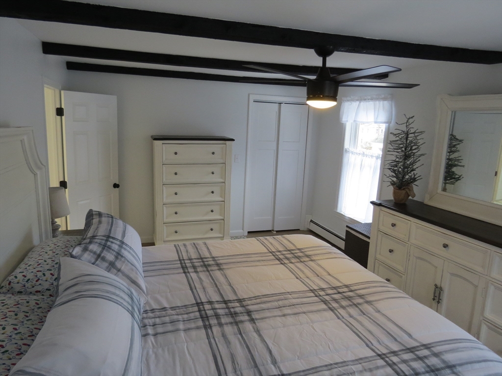 7 Maple Place Winchendon, MA 01475 - Photo 11 of 22 a bedroom with a bed and a dresser