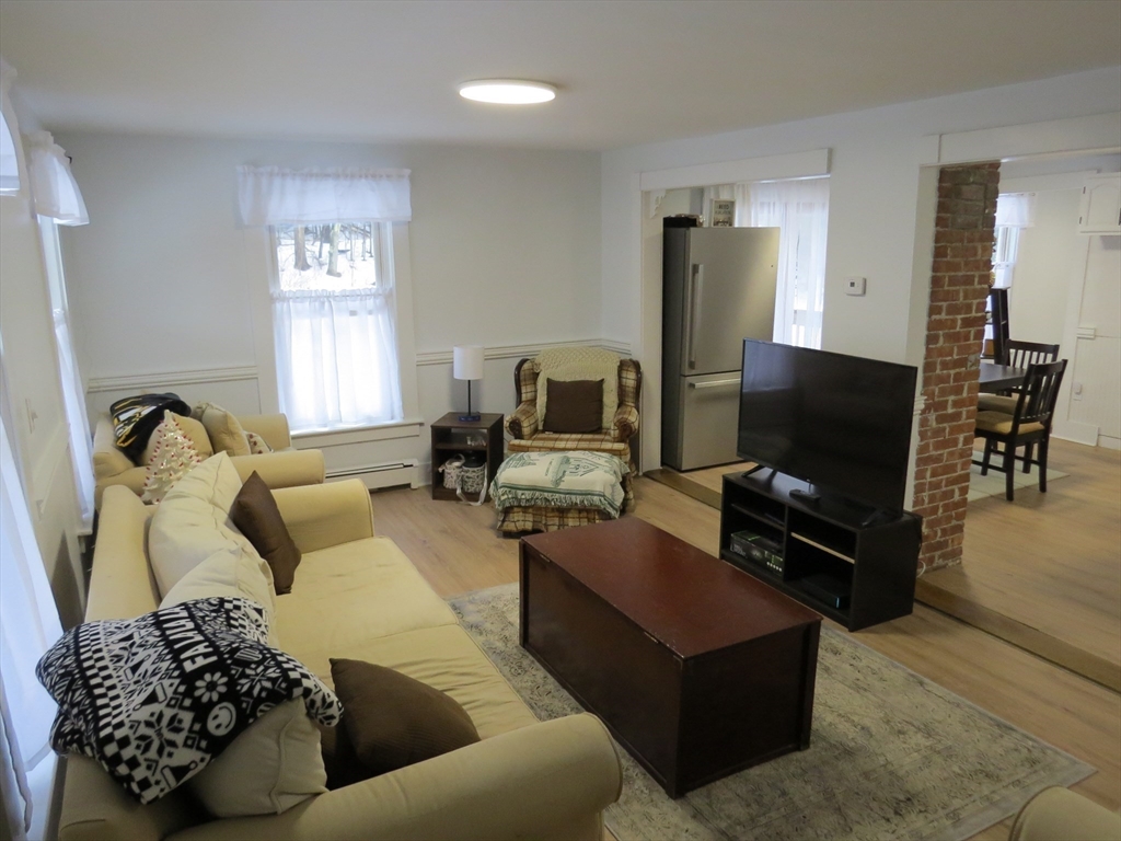 7 Maple Place Winchendon, MA 01475 - Photo 7 of 22 a living room with furniture and a flat screen tv