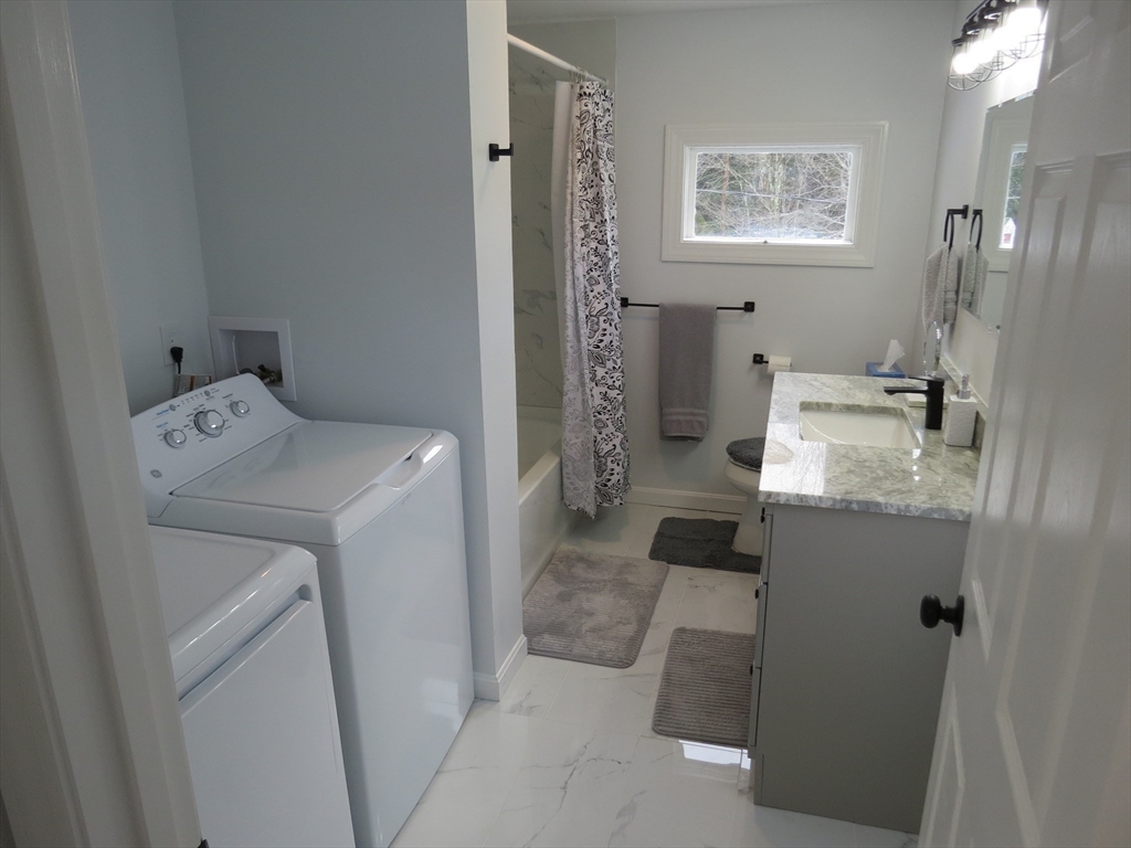7 Maple Place Winchendon, MA 01475 - Photo 8 of 22 a utility room with dryer and washer