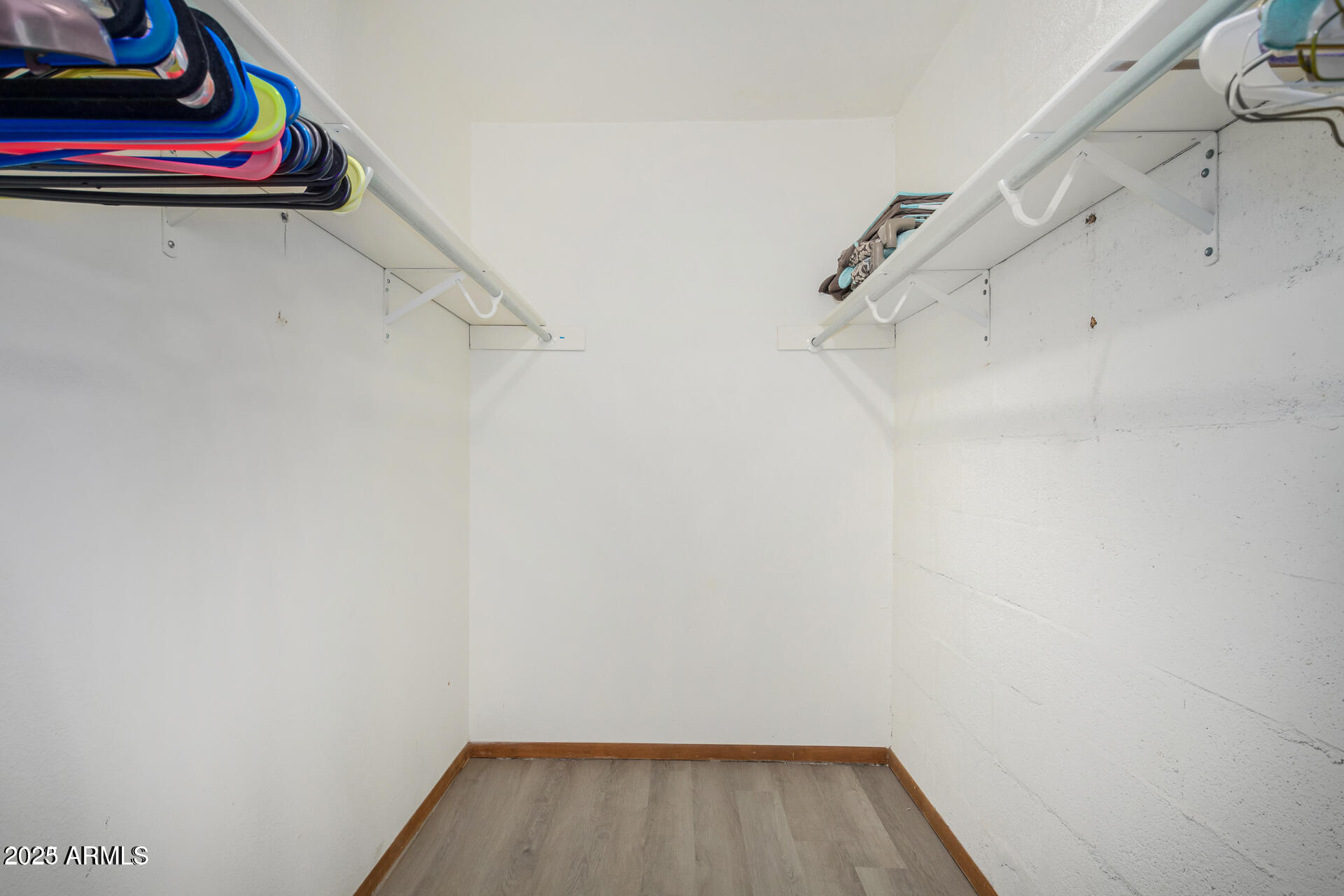 7625 East Camelback Road, Unit A133 Scottsdale, AZ 85251 - Photo 19 of 26 a view of small space with racks on the wall