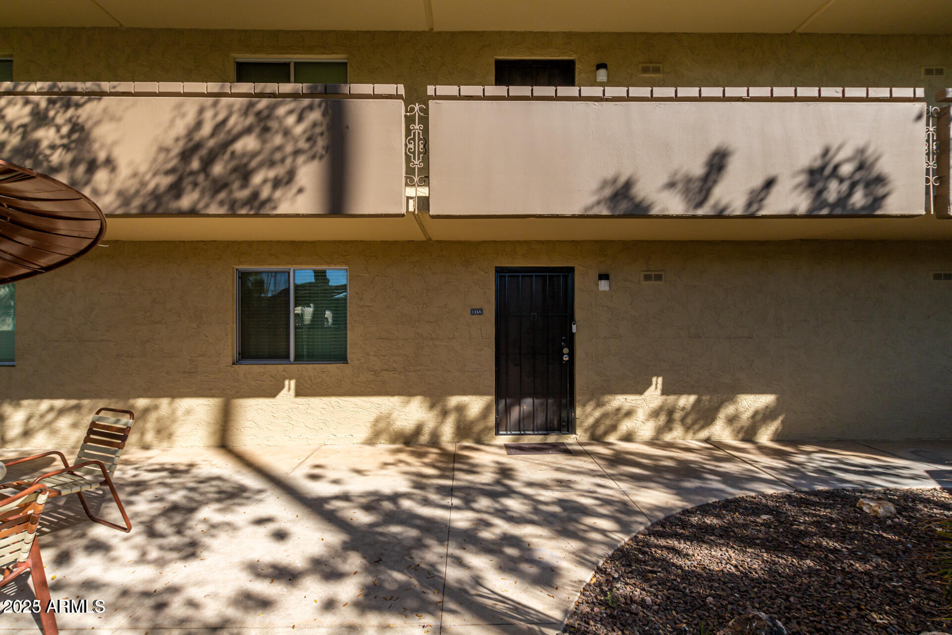 7625 East Camelback Road, Unit A133 Scottsdale, AZ 85251 - Photo 6 of 26 a view of a room with wooden floor