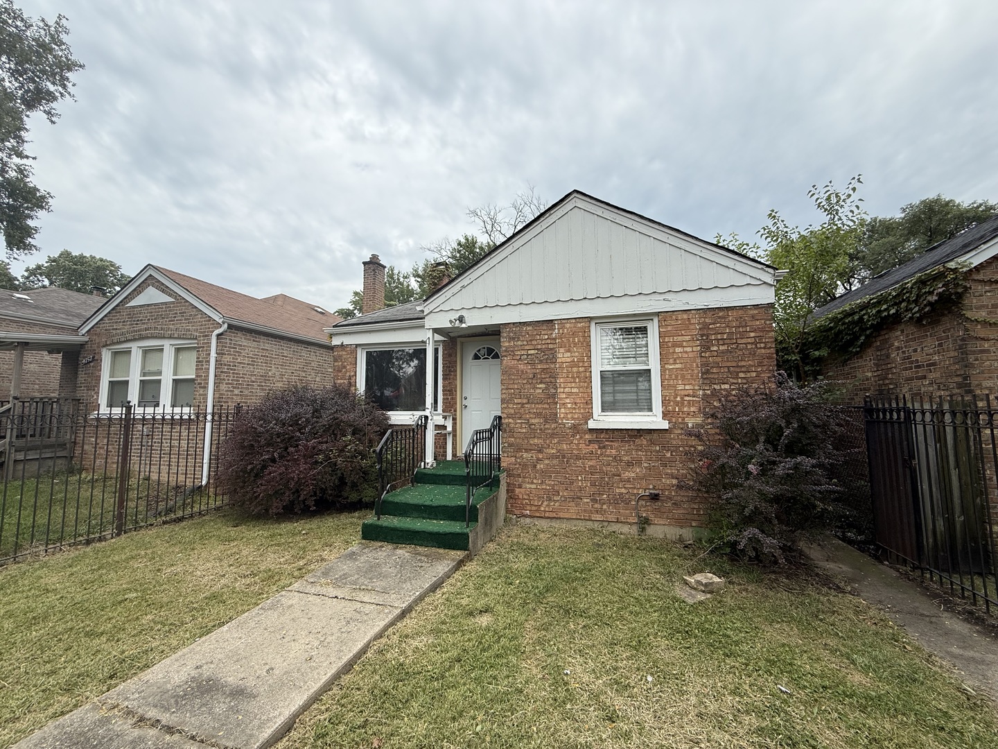 9761 South Ingleside Avenue Chicago, IL 60628 - Photo 1 of 14
