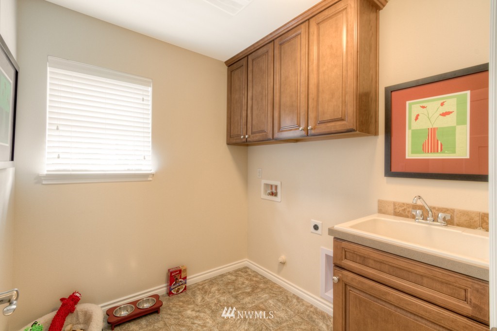 18201 41st Avenue Southeast Bothell, WA 98012 - Photo 18 of 19 a bathroom with a sink and a window