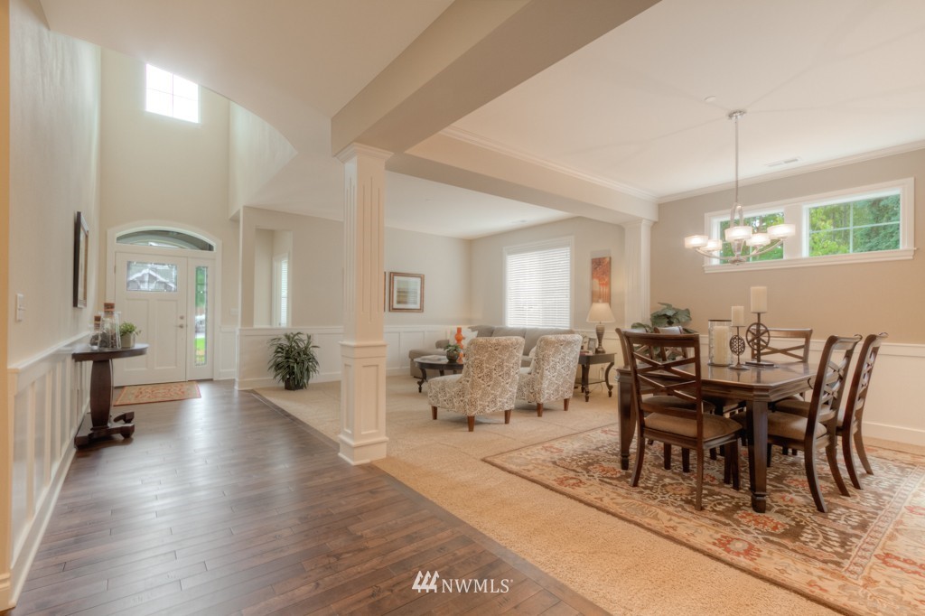 18201 41st Avenue Southeast Bothell, WA 98012 - Photo 3 of 19 a view of a dining room with furniture
