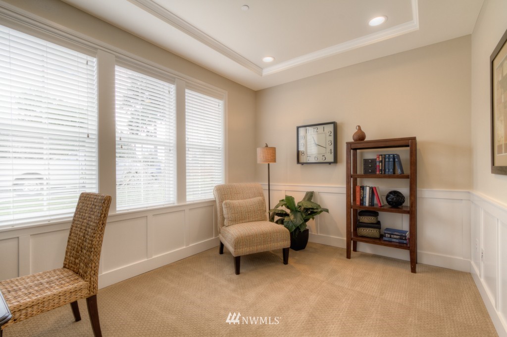 18201 41st Avenue Southeast Bothell, WA 98012 - Photo 8 of 19 a living room with furniture and a window