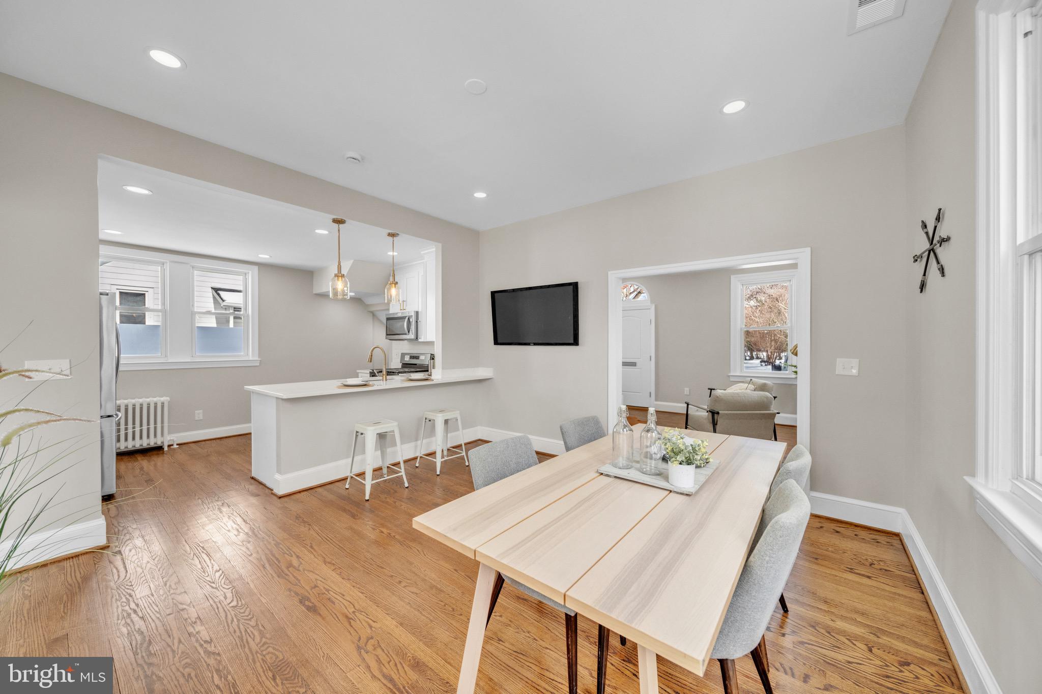 6018 2nd Street Northwest Washington, DC 20011 - Photo 4 of 18 a view of a dining room with furniture and wooden floor
