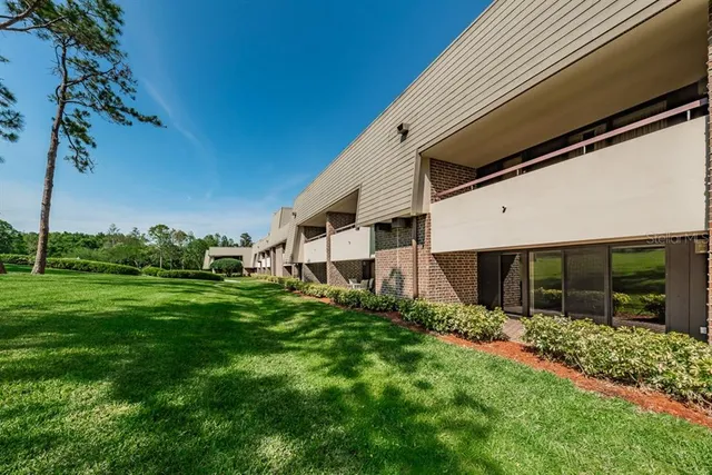 a view of a back yard of the house