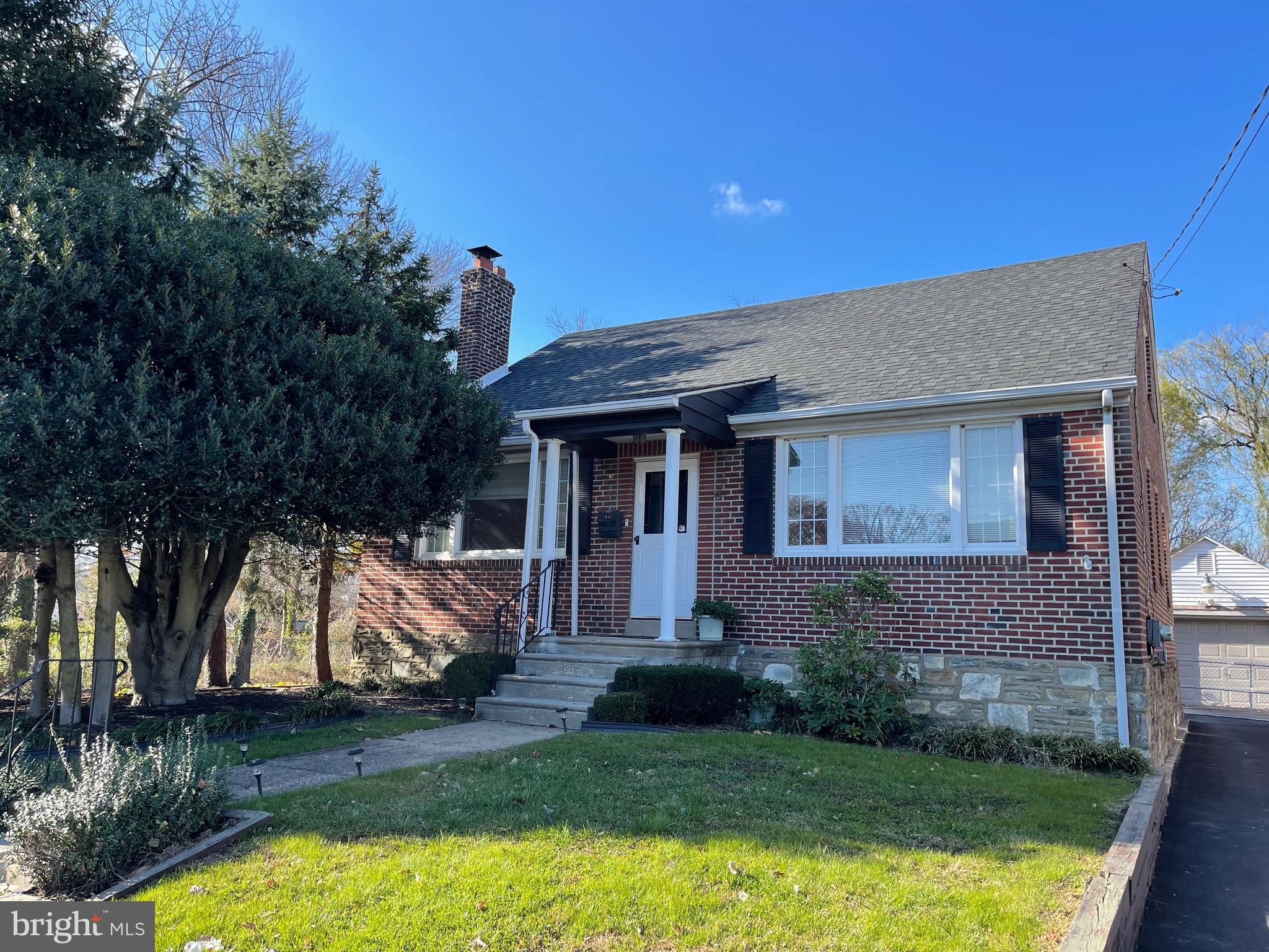 7940 Church Road Jenkintown, PA 19046 - Photo 1 of 38 a view of a house with backyard porch and furniture