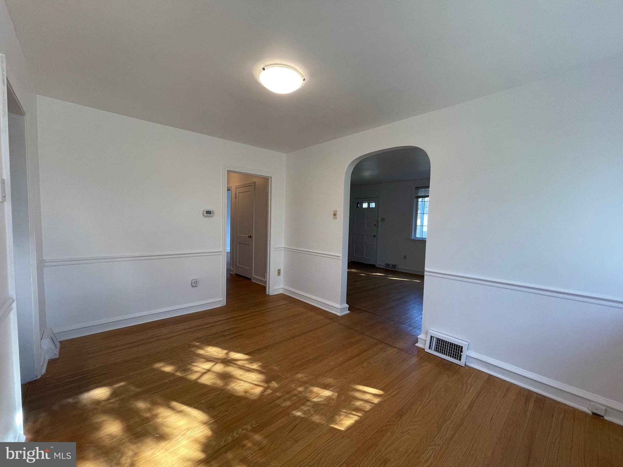 7940 Church Road Jenkintown, PA 19046 - Photo 11 of 38 an empty room with wooden floor