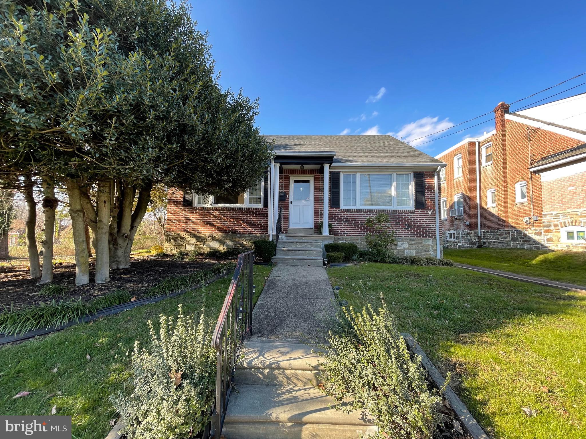 7940 Church Road Jenkintown, PA 19046 - Photo 3 of 38 a front view of a house with garden