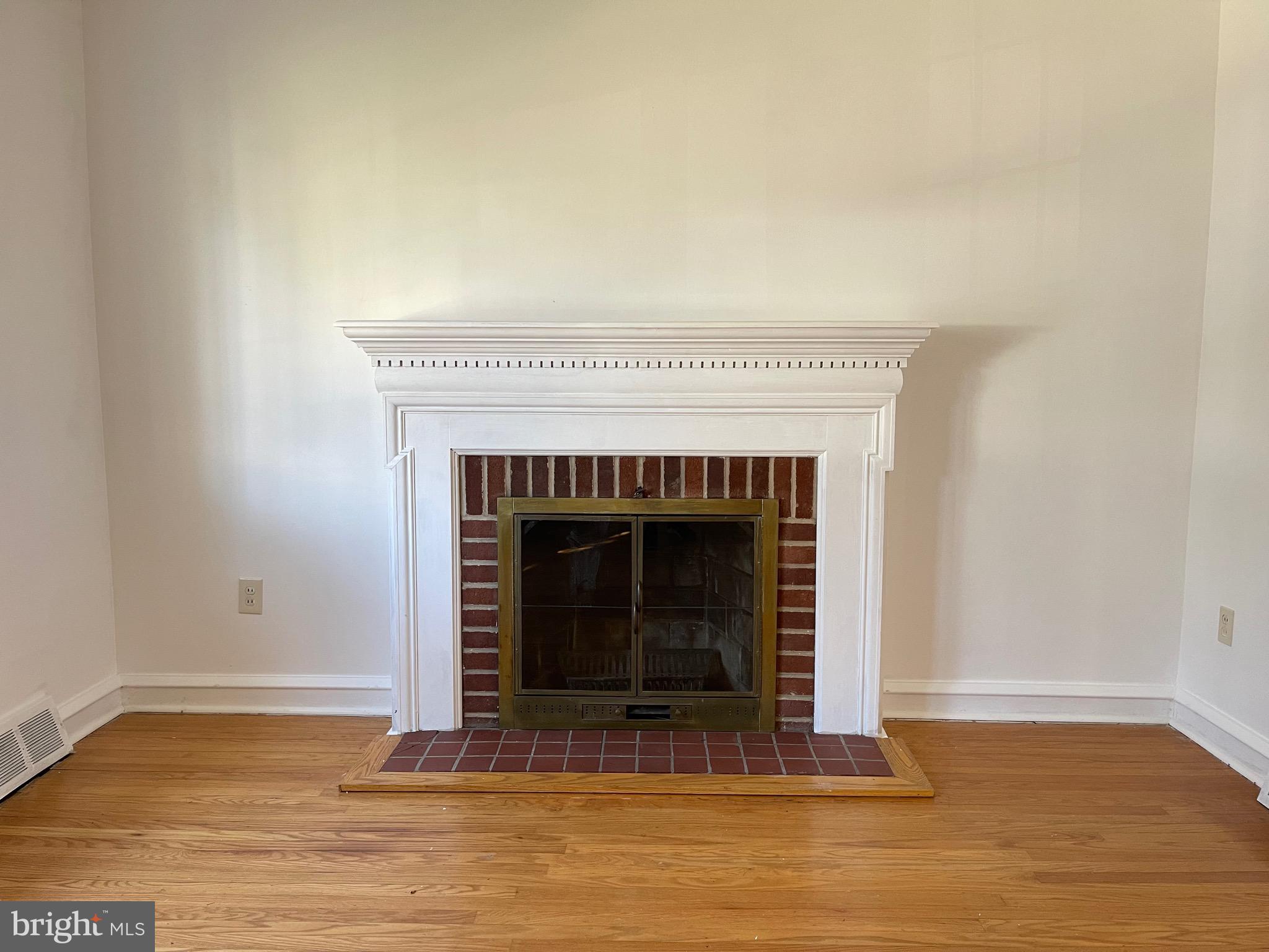 7940 Church Road Jenkintown, PA 19046 - Photo 8 of 38 a living room with fireplace