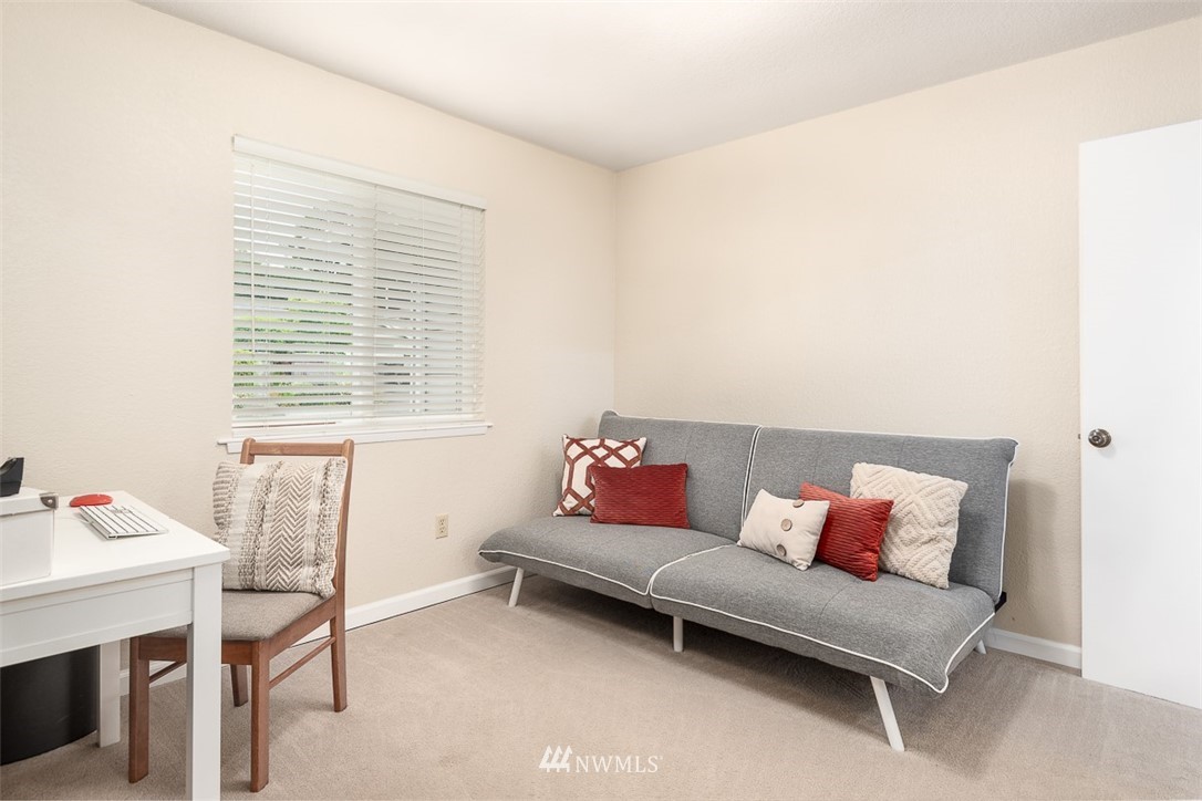 1326 232nd Place Southwest Bothell, WA 98021 - Photo 12 of 23 a living room with furniture and a window