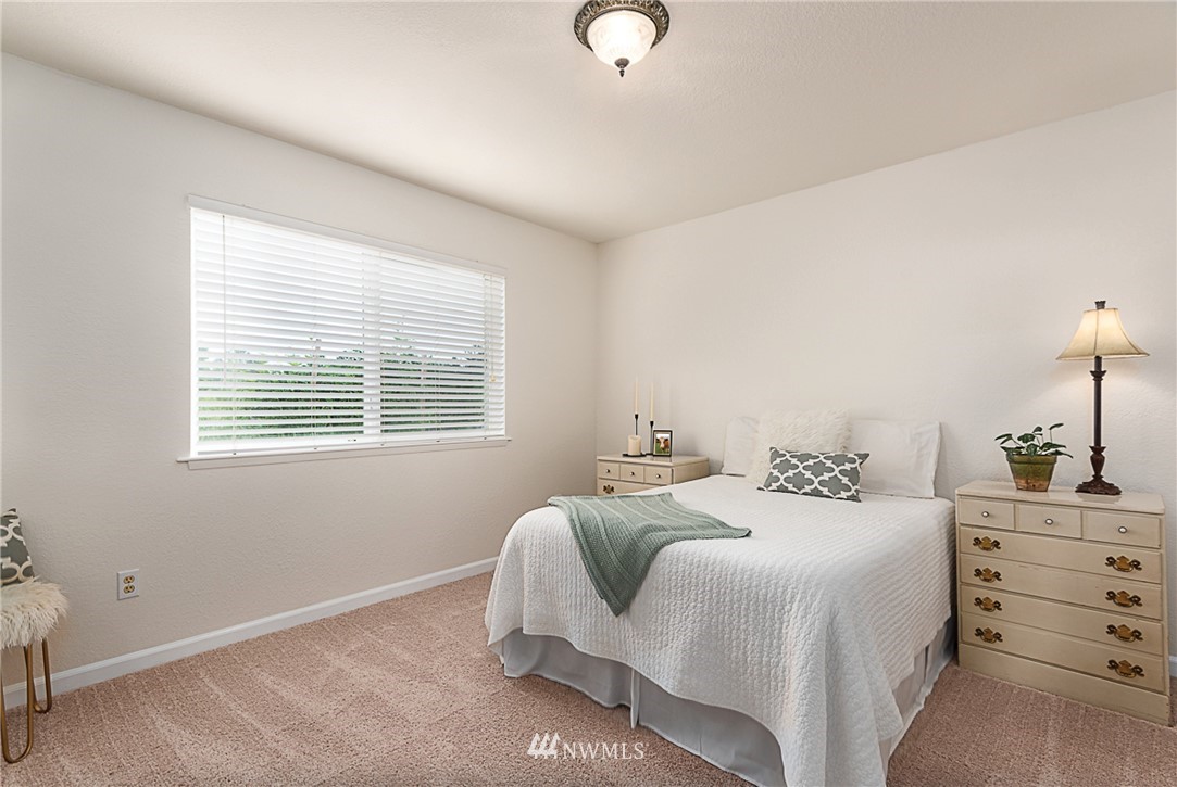 1326 232nd Place Southwest Bothell, WA 98021 - Photo 13 of 23 a bedroom with a bed and with furniture