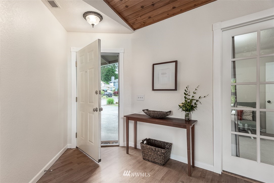 1326 232nd Place Southwest Bothell, WA 98021 - Photo 4 of 23 a room with furniture and window