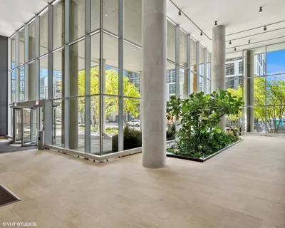 a view of a potted plants next to a yard