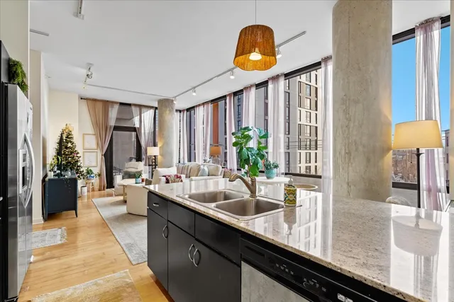 a view of an chairs and table in the balcony