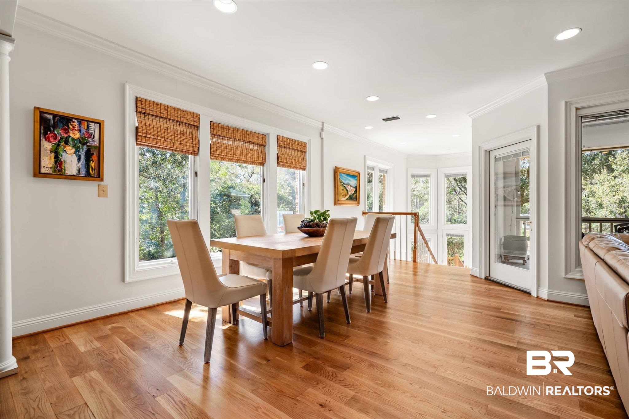 4 Kingsway Mobile, AL 36608 - Photo 13 of 44 Dining room featuring light wood-style flooring, recessed lighting, crown molding, decorative columns, and baseboards