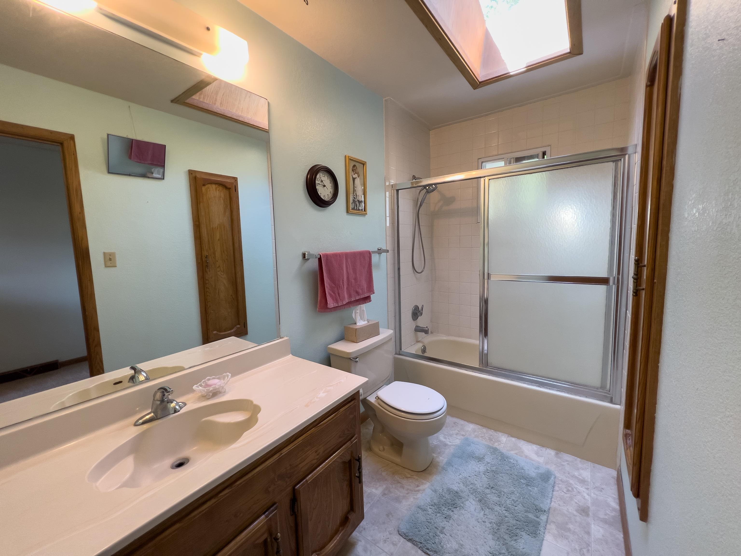 477 35 Road Palisade, CO 81526 - Photo 16 of 32 a bathroom with a sink a toilet and shower