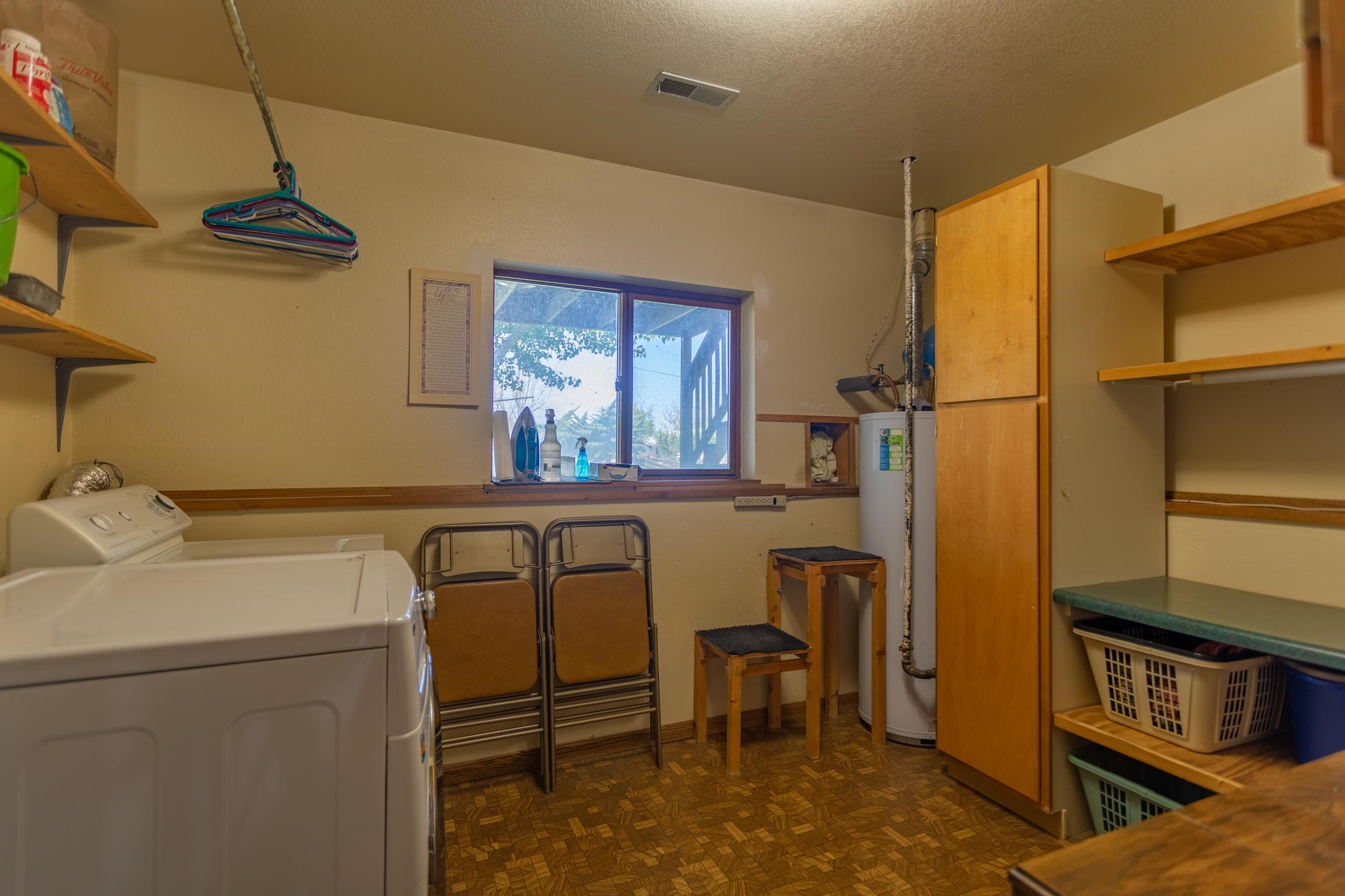 477 35 Road Palisade, CO 81526 - Photo 21 of 32 a kitchen with stainless steel appliances granite countertop a sink and a refrigerator