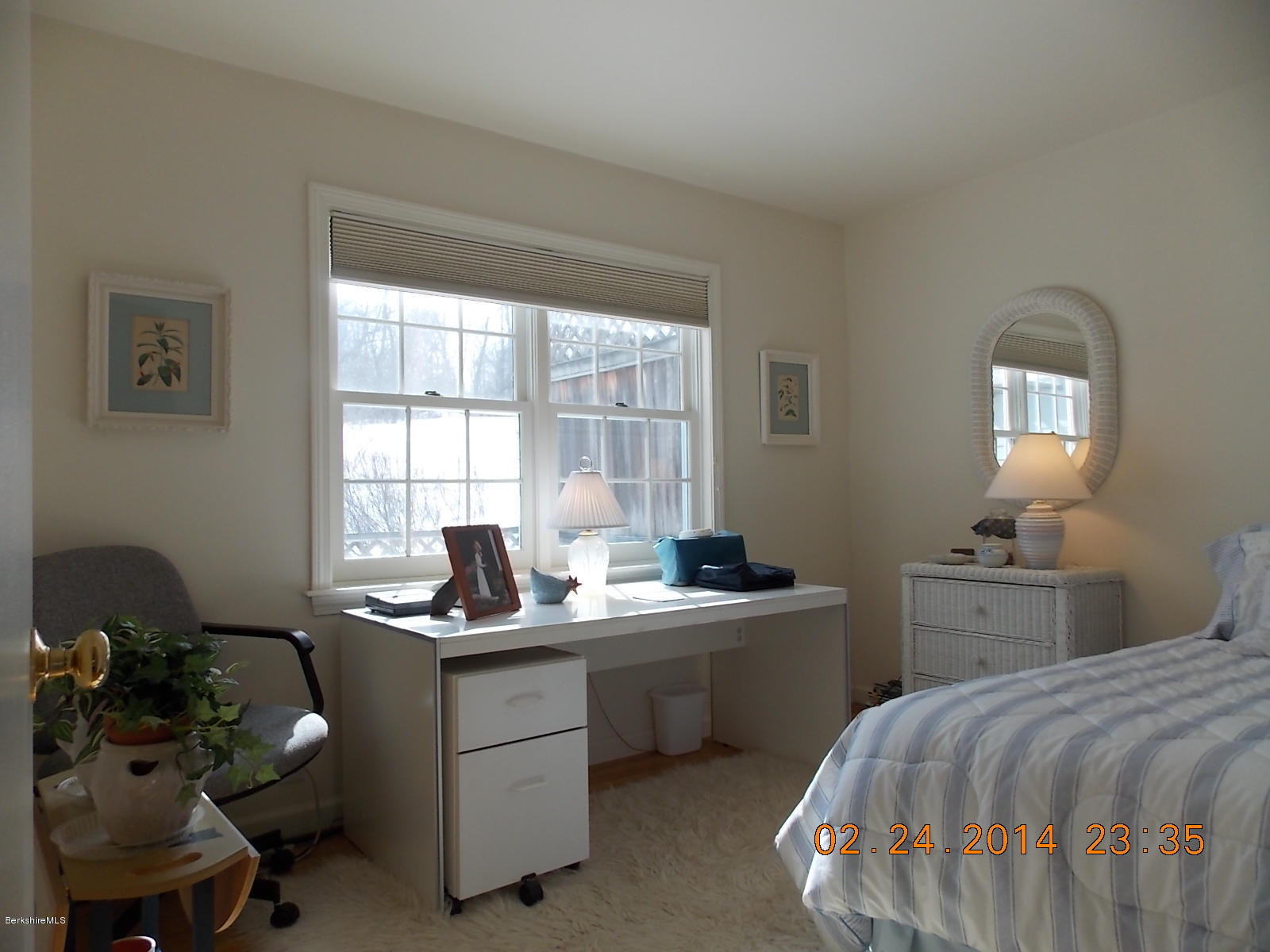 1136-9 Barker Road, Unit 9 Pittsfield, MA 01201 - Photo 13 of 45 a room with a bed and a window