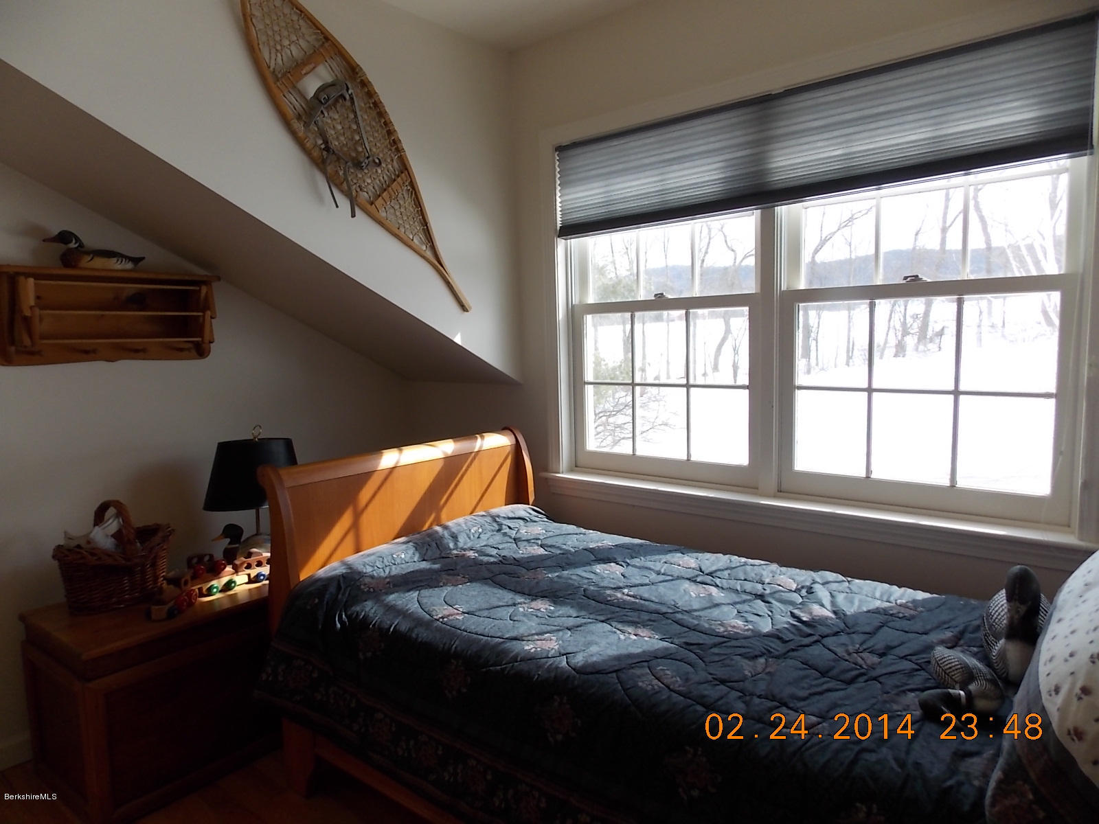1136-9 Barker Road, Unit 9 Pittsfield, MA 01201 - Photo 15 of 45 a bedroom with a bed and a window