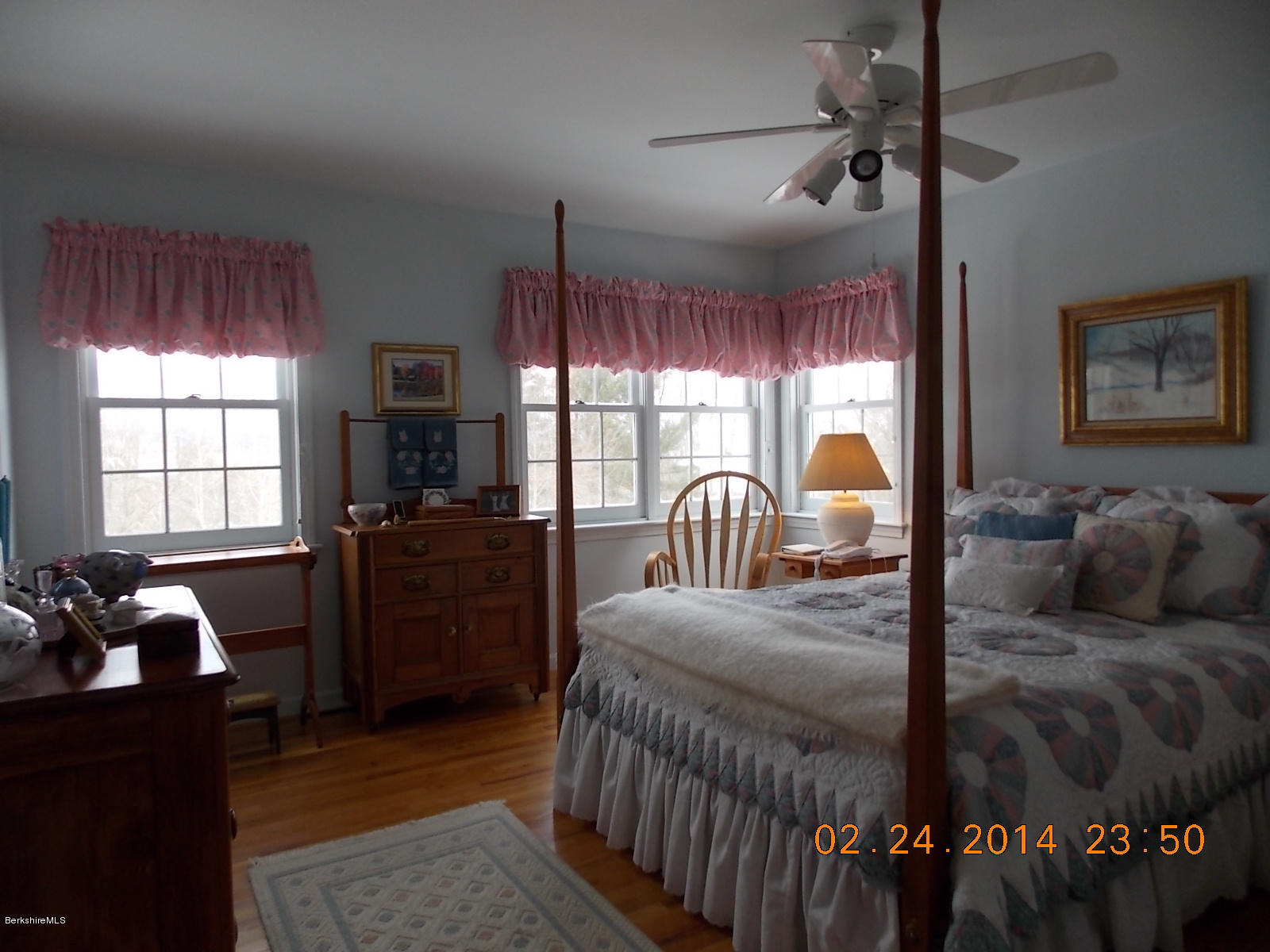 1136-9 Barker Road, Unit 9 Pittsfield, MA 01201 - Photo 17 of 45 a bedroom with a bed and a large window