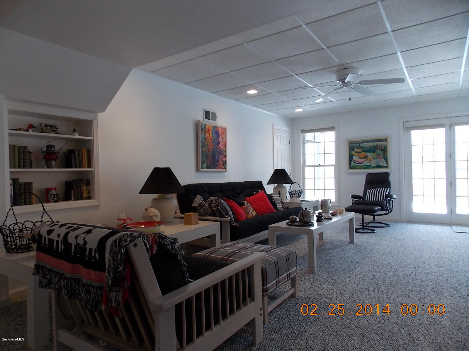 1136-9 Barker Road, Unit 9 Pittsfield, MA 01201 - Photo 26 of 45 a living room with furniture a couch and a window