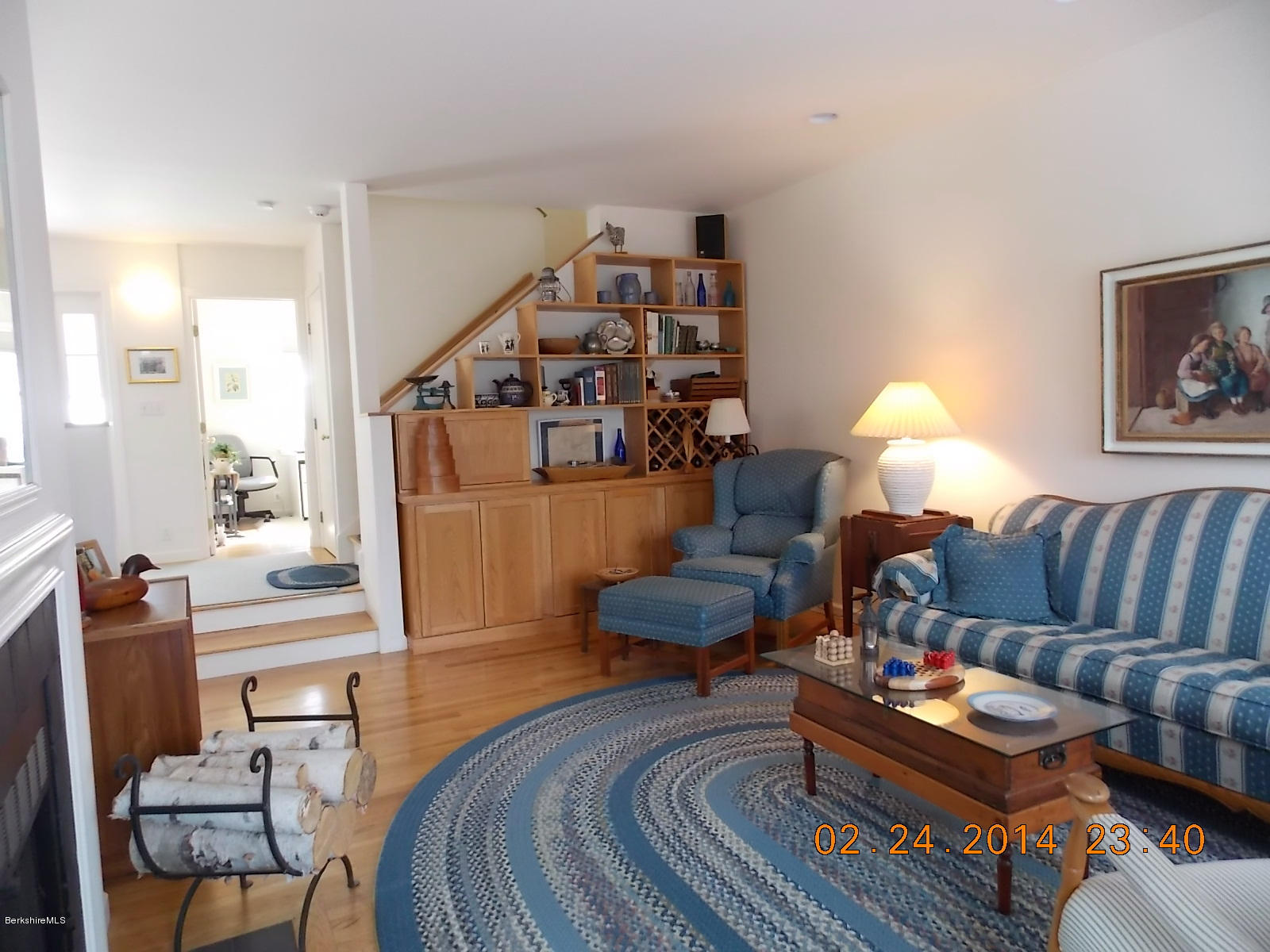 1136-9 Barker Road, Unit 9 Pittsfield, MA 01201 - Photo 30 of 45 a living room with furniture and wooden floor